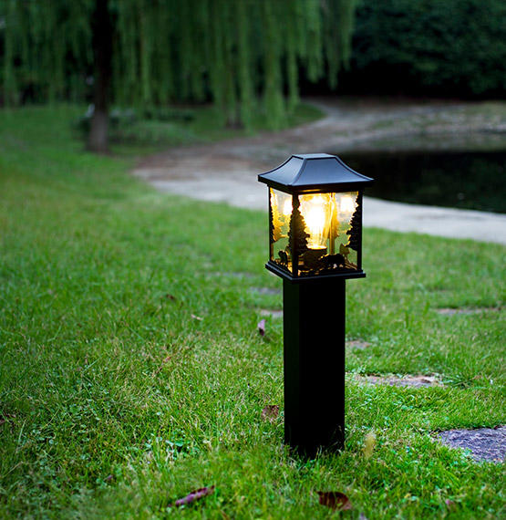 What are the considerations in the design of outdoor wall lamps
